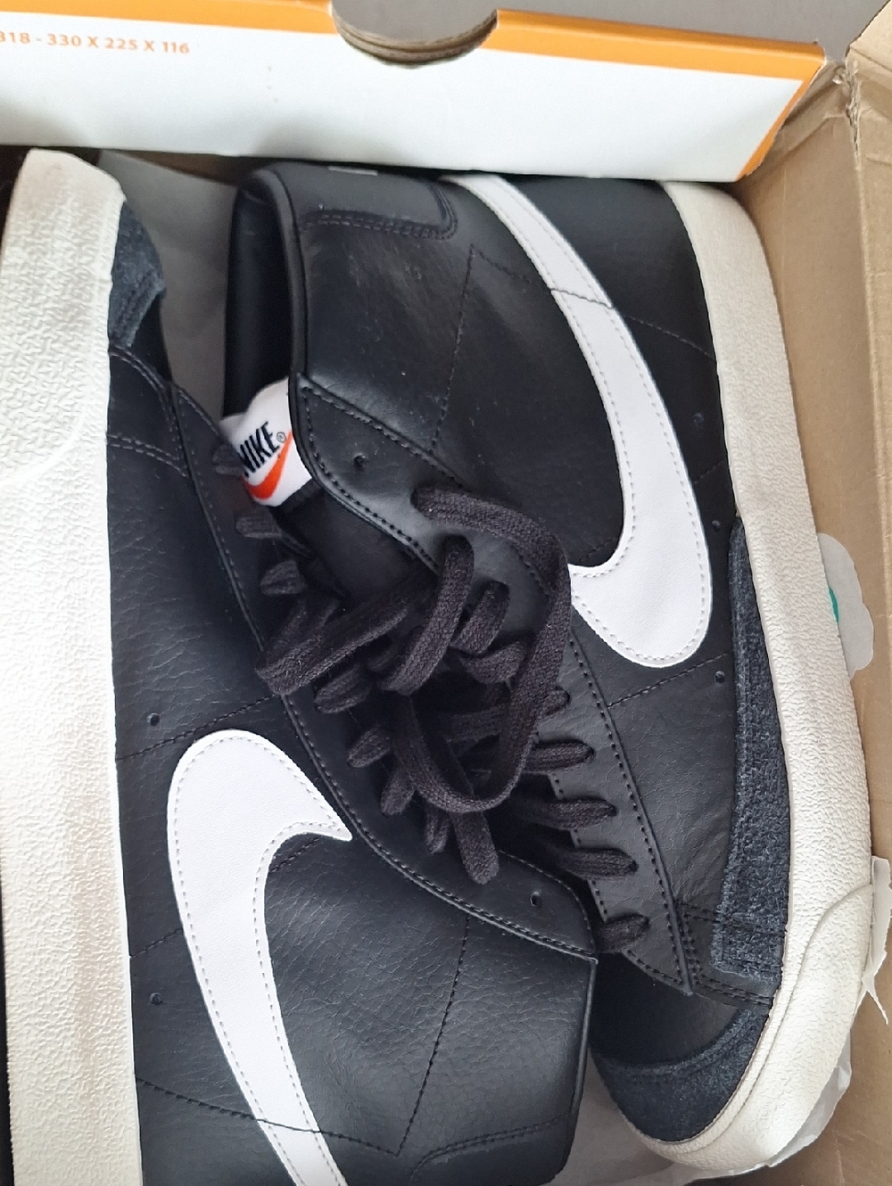 Nike Black & White Mid-Top Sneakers with White Swoosh